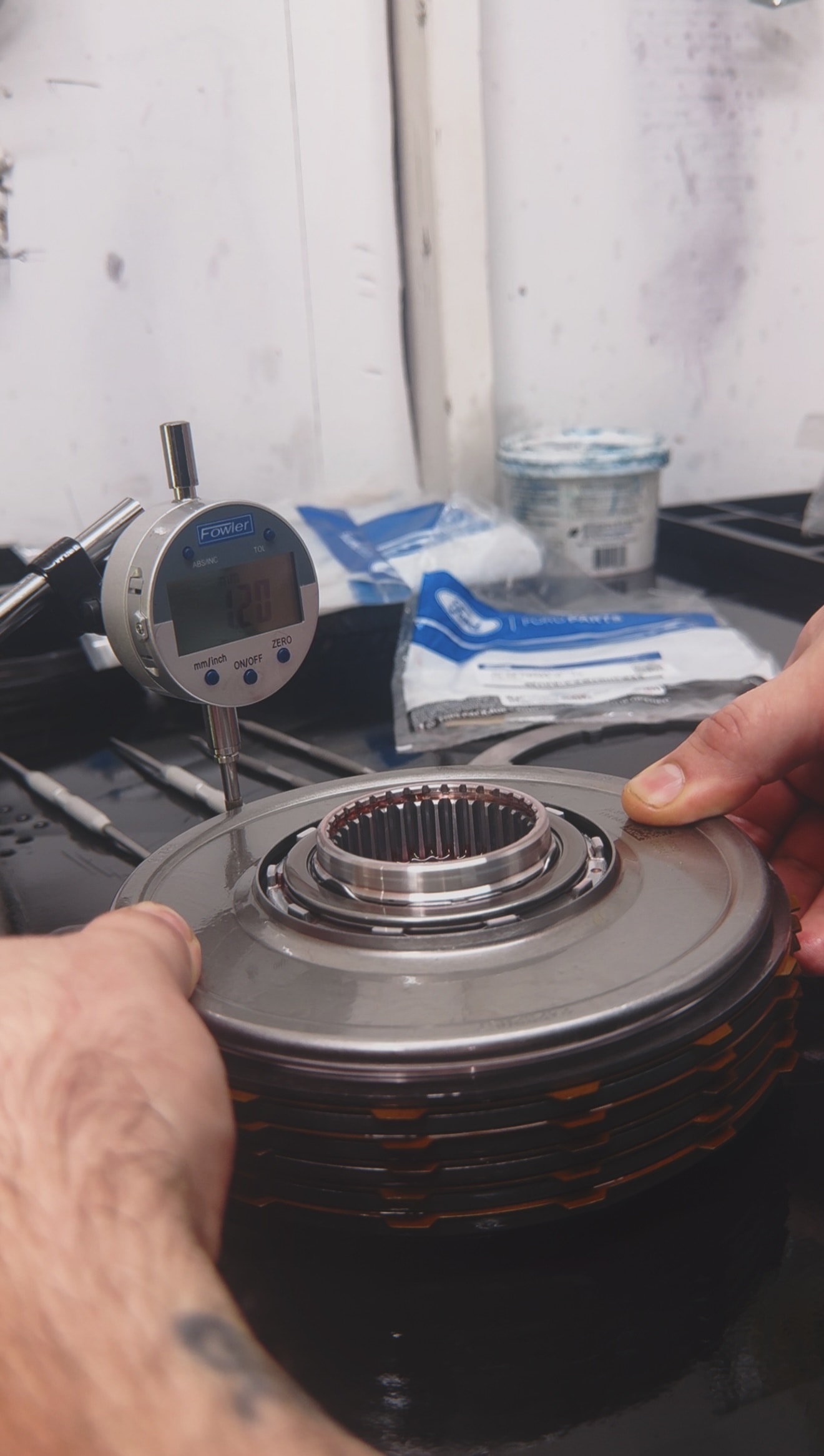 Technician assembling transmission